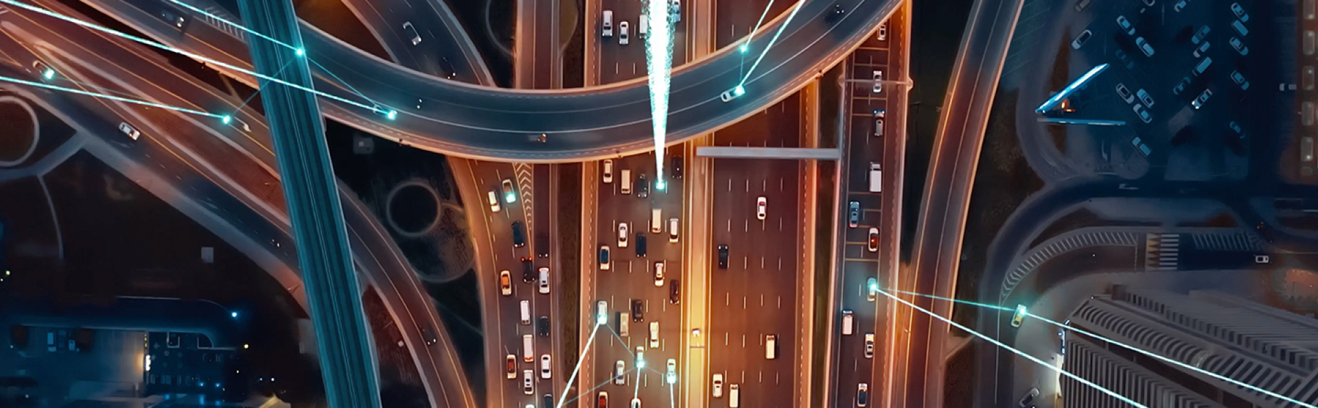 Aerial view of a highway intersection with digital network connection lines.